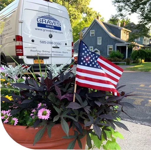 American flag on a post with a barrel