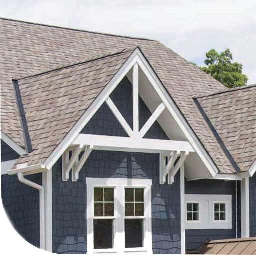 A quaint cottage with a peaked roof and double doors. The house appears to be rendered in a sketchy or drawn style.