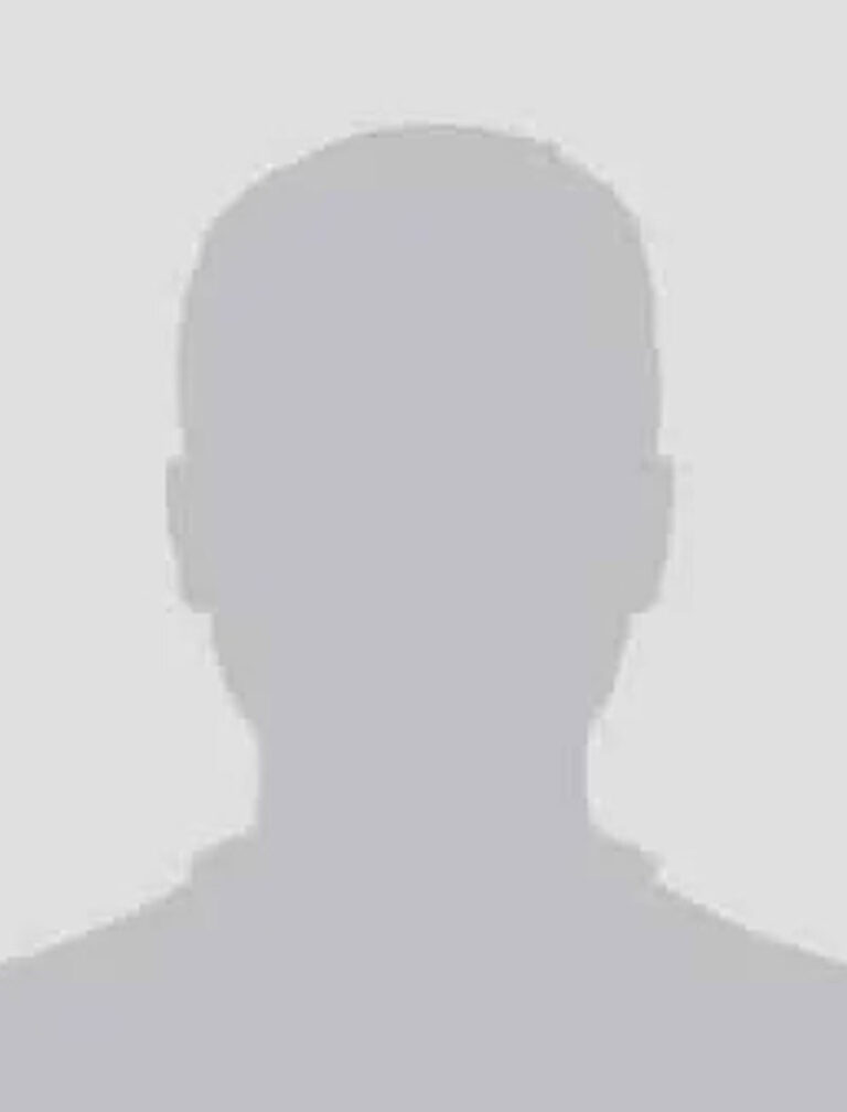 A gray silhouette of a man's head and shoulders. No facial features are visible.
