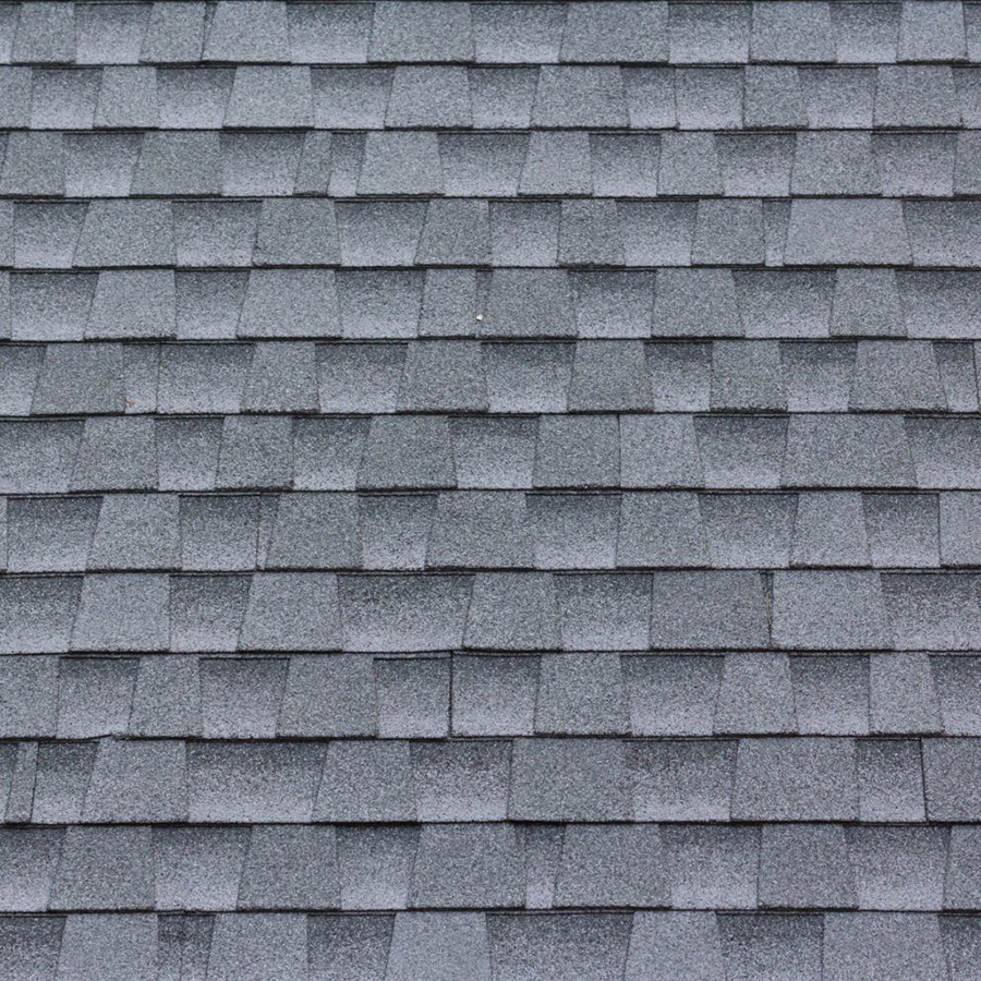 Gray roof shingles, closely packed and layered.