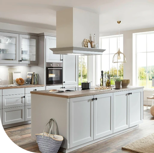 A kitchen island with decor and a black and white filter