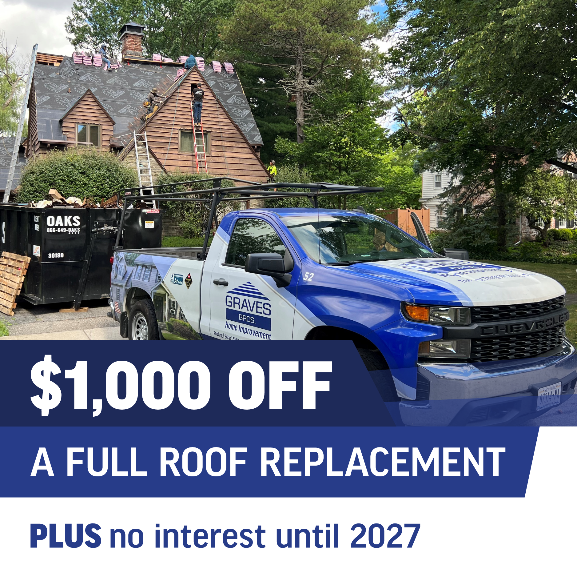 A blue and white Graves Roofing truck parked near a house where workers are installing a new roof.