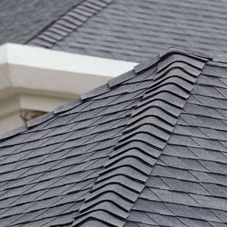 Dark grey roof shingles with white trim